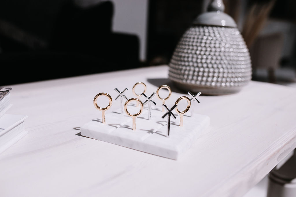 A playful and decorative noughts and crosses object