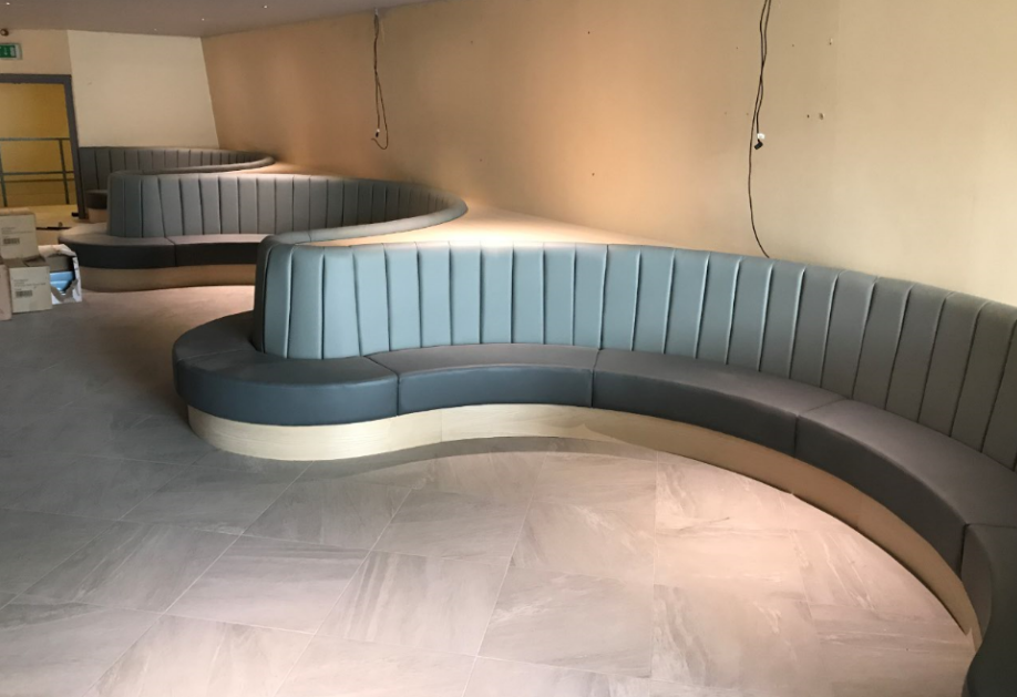 Curved, bespoke, fixed seating